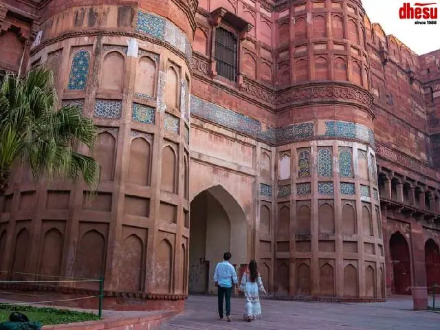 Red sandstone gateway of the Mughal-era Agra Fort in India