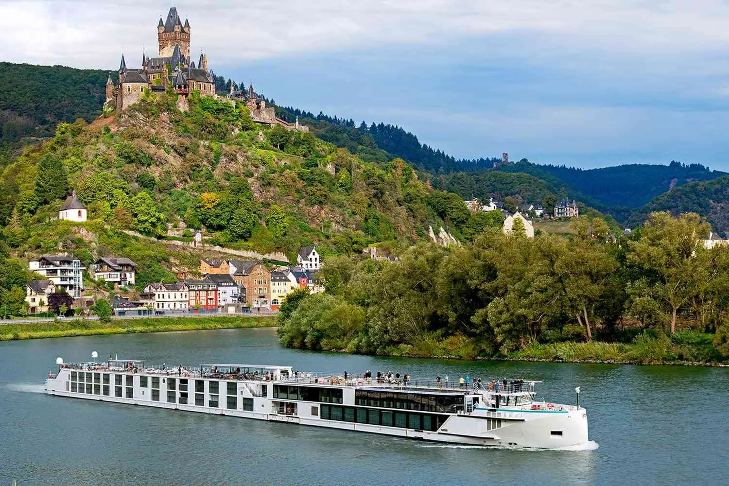 A river cruise ship passing the castle town of Cochem