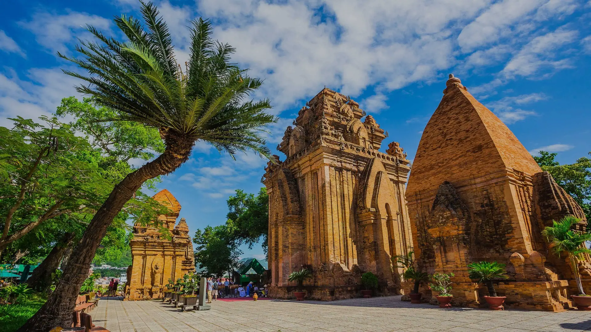 The brick Po Nagar Cham towers standing among palms at Nha Trang, Vietnam